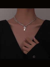 « Edelstahl Eleganz: Die Luxuriöse Designerkette mit Kreuzperlen – Milka für die modebewusste Dame »
